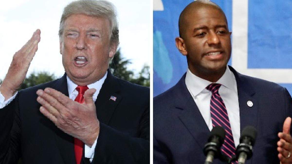 El presidente Donald Trump y Andrew Gillum (der.), alcalde de Tallahassee y candidato por la gobernación de Florida.
