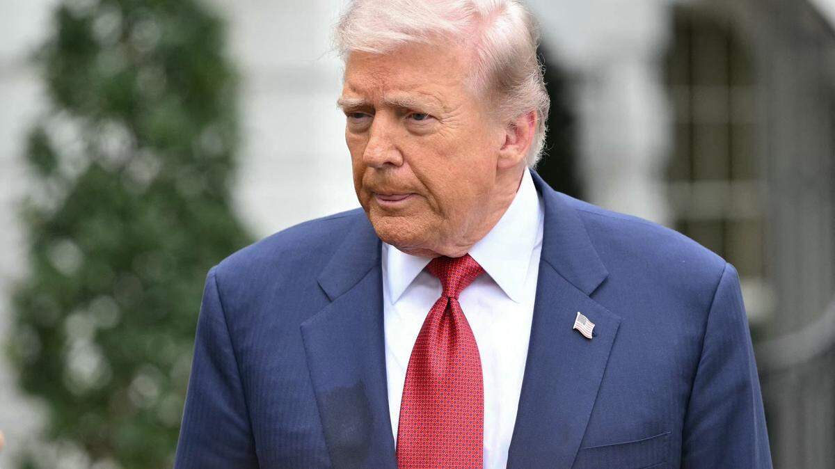 US President Donald Trump speaks to journalists as he makes his way to board Marine One before departing from the South Lawn of the White House in Washington, DC on May 8, 2026. Trump is traveling to Sterling, Virginia, where he will participate in a LIV Golf dinner. (Photo by Mandel NGAN / AFP via Getty Images)