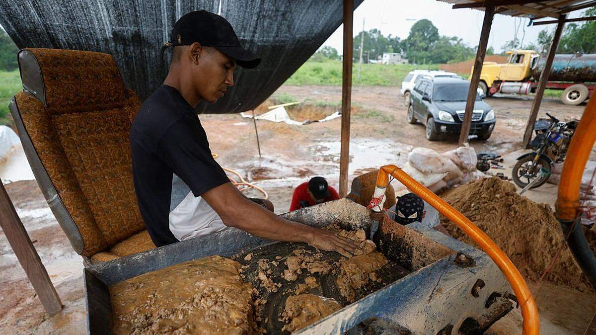 A man works in an artisanal gold mine in the town of El Dorado, Bolívar state, Venezuela, on May 25, 2025. El Dorado is part of a region dubbed by the government as the Orinoco Mining Arc — an area that has vast mineral reserves and is plagued by illegal mining and organized crime, and where the trade in gold dust is commonplace.