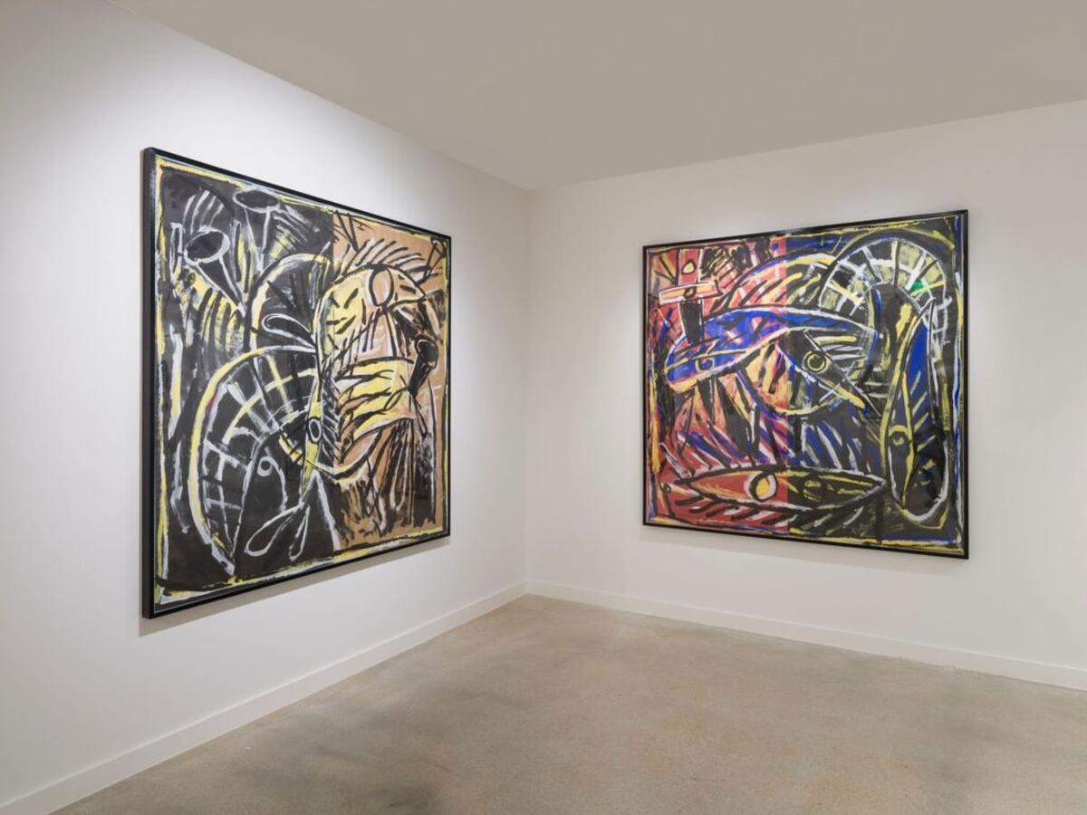 Dos obras sobre papel de Carlos Alfonzo, cada una titulada “Autorretrato”. El artista emigró a Miami durante el éxodo del Mariel en 1980. 