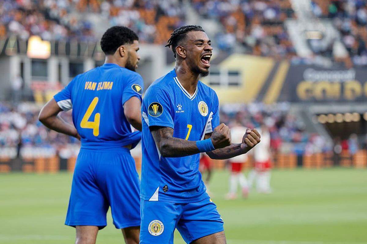 Curacao soccer player Juninho Bacuna celebrates his team's first goal against Canada during a 2025 CONCACAF Gold Cup group-stage match at Shell Energy Stadium in Houston on June 21, 2025.
