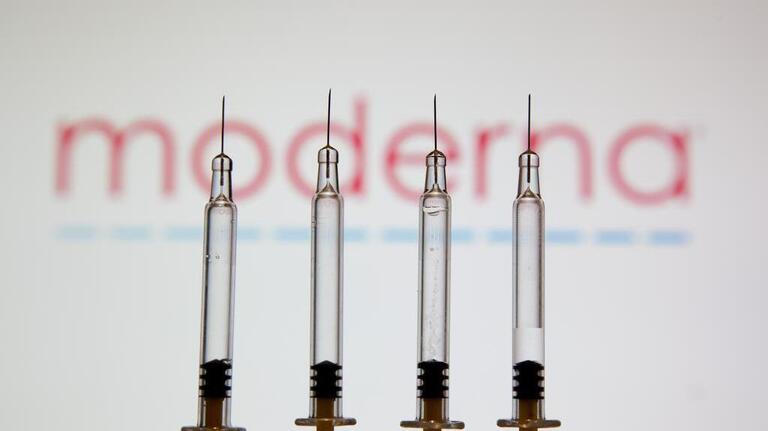 Moderna COVID vaccine may be less effective against omicron, chief says. What to know