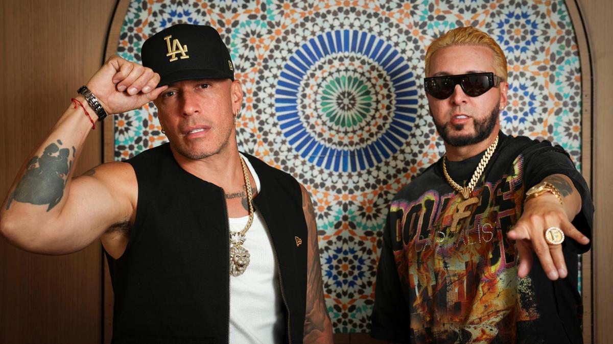 Alexis & Fido, a puerto rican reggaeton duo, pose during an interview on Monday, May 5, 2025, at Sufrat Restaurant in Doral, Fla. The urban duo is celebrating 20 years of their musical career. El dúo urbano está celebrando sus 20 años de trayectoria musical.