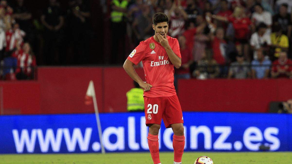 El delantero del Real  Madrid Marco Asensio durante el partido contra el Sevilla, celebrado el 26 de septiembre de 2018 en el estadio Sánchez Pizjuán en Sevilla.