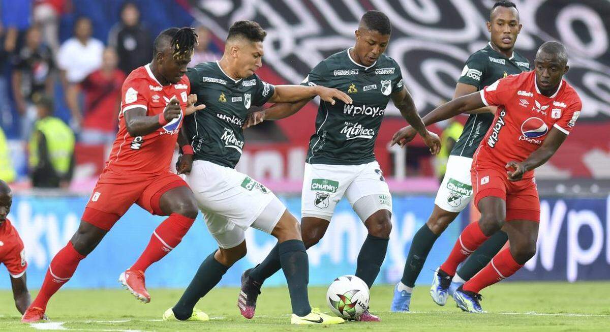 Deportivo Cali (verde) y América de Cali (rojo), actores del clásico más importante en Colombia, se enfrentarán en julio en una cancha levantada en el Autódromo Internacional de Daytona.