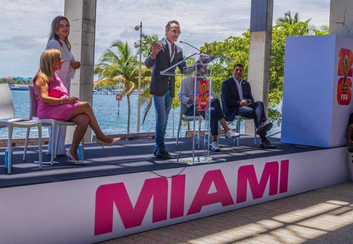 Alina T. Hudak (far left), President-CEO FIFA World Cup 26 and Chief Marketing Janelle Prieto, joined the special guest artist Marc Anthony, as he speaks, during the “One Year Out” celebration hosted by the Miami Host Committee and FIFA at the Pérez Art Museum Miami (PAMM), on Wednesday June 11, 2025.