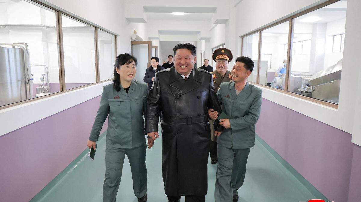 TOPSHOT - This picture taken on December 24, 2025 and released by North Korea's official Korean Central News Agency (KCNA) via KNS on December 25, 2025 shows North Korean leader Kim Jong Un (C) inspecting a food factory in Jongpyong County, South Hamgyong Province, where an inauguration ceremony was held. (Photo by KCNA VIA KNS / AFP via Getty Images) / South Korea OUT / ---EDITORS NOTE--- RESTRICTED TO EDITORIAL USE - MANDATORY CREDIT "AFP PHOTO/KCNA VIA KNS" - NO MARKETING NO ADVERTISING CAMPAIGNS - DISTRIBUTED AS A SERVICE TO CLIENTS THIS PICTURE WAS MADE AVAILABLE BY A THIRD PARTY. AFP CAN NOT INDEPENDENTLY VERIFY THE AUTHENTICITY, LOCATION, DATE AND CONTENT OF THIS IMAGE. /