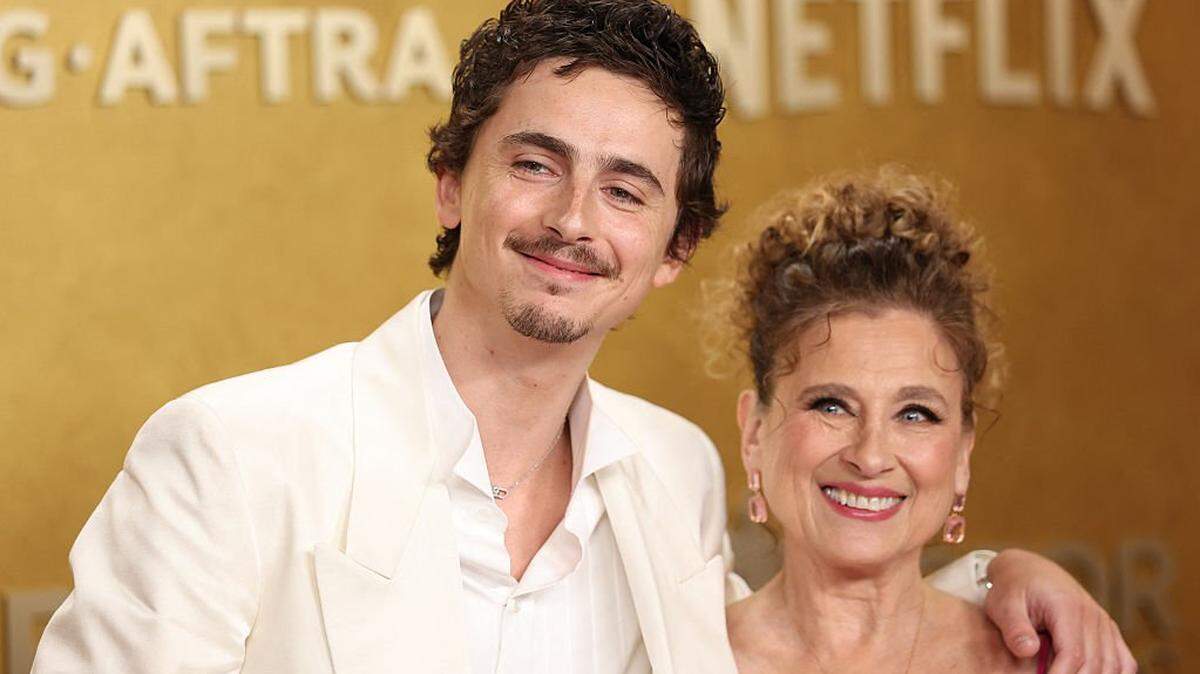 French-US actor Timothee Chalamet and his mother Nicole Flender attend the 32nd Annual Actor Awards at the Shrine Auditorium in Los Angeles on March 1, 2026. (Photo by PATRICK T. FALLON / AFP via Getty Images)