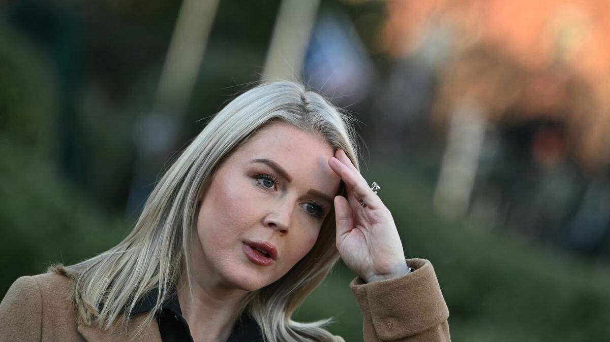 White House Press Secretary Karoline Leavitt speaks to journalists outside the West Wing of the White House in Washington, DC, on November 24, 2025. (Photo by ANDREW CABALLERO-REYNOLDS / AFP via Getty Images)