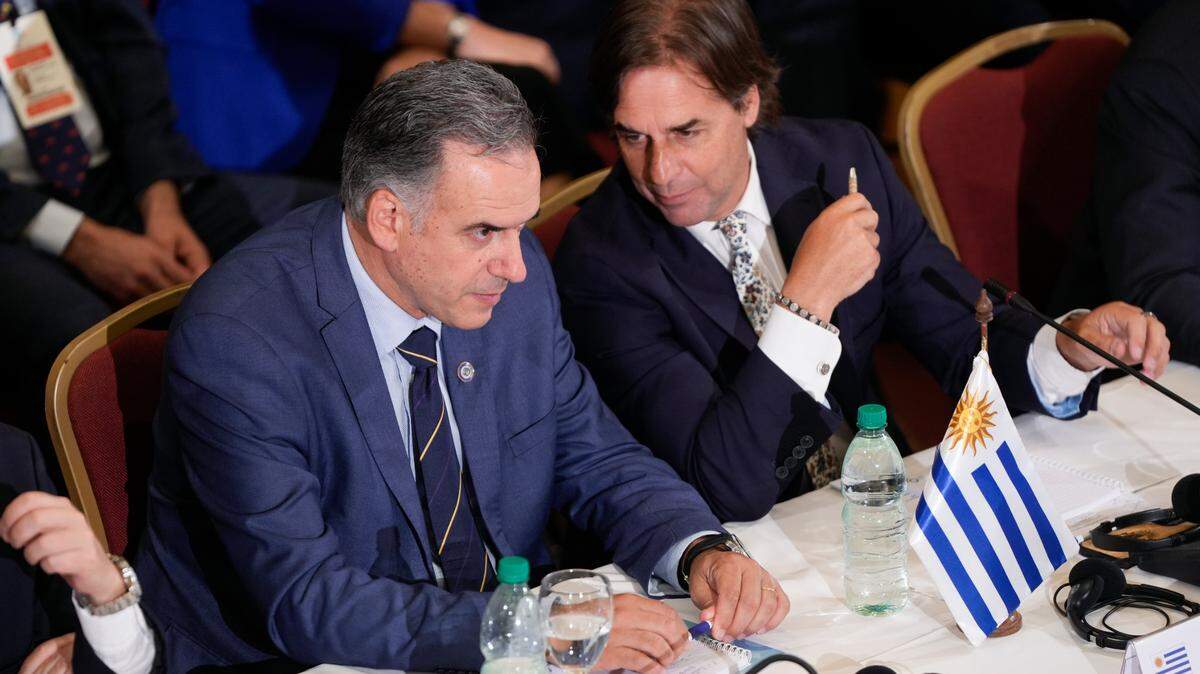 (241207) -- MONTEVIDEO, Dec. 7, 2024 (Xinhua) -- Uruguayan President Luis Lacalle Pou (R) and president-elect Yamandu Orsi attend the 65th Summit of the Heads of State of the Southern Common Market (Mercosur) in Montevideo, Uruguay, Dec. 6, 2024.
  The 65th Mercosur Summit, taking place Thursday and Friday in Montevideo, marks a pivotal moment for the South American bloc, according to the participants. (Photo by Nicolas Celaya/Xinhua) (Photo by Xinhua/Sipa USA)