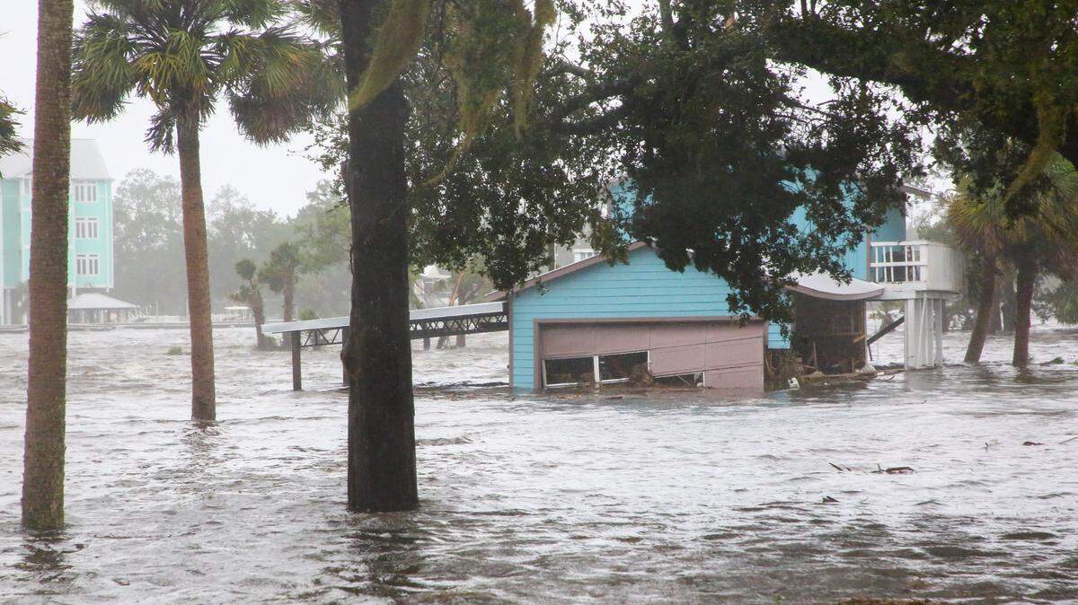 Storm surge floods a home off Riverside Drive on the Steinhatchee River in Steinhatchee on Wednesday, Aug 30, 2023, as Hurricane Idalia moves through Florida’s west coast at Taylor County in the Big Bend area.