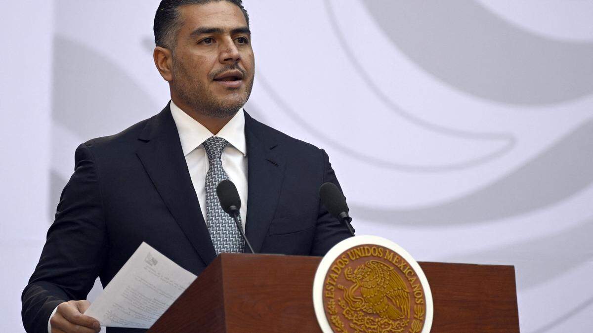 Mexico's Secretary of Security and Civilian Protection Omar Garcia Harfuch speaks during the presentation of the Michoacan Plan for Peace and Justice at the National Palace in Mexico City on November 9, 2025. Claudia Sheinbaum's government announced on November 9, 2024, that it would reinforce the military presence and official authorities in the western state of Michoacan following the murder of a mayor that has outraged the whole of Mexico. (Photo by Alfredo ESTRELLA / AFP) (Photo by ALFREDO ESTRELLA/AFP via Getty Images)