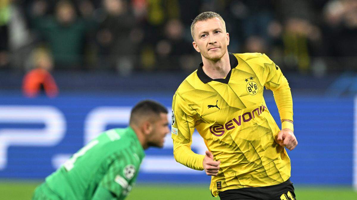 Marco Reus celebra tras anotar un gol para el Borussia Dortmund en el triunfo 2-0 ante el PSV Eindhoven, el miércoles 13 de marzo de 2024.