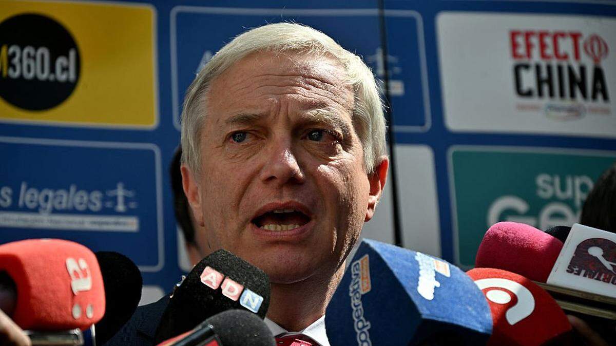 Chile's presidential candidate Jose Antonio Kast, from the Republican Party, speaks to reporters after taking part in a debate at Radio Cooperativa in Santiago on November 27, 2025. Leftist candidate Jeannette Jara and far-right leader Jose Antonio Kast will face off in Chile's presidential runoff on December 14. (Photo by RODRIGO ARANGUA / AFP via Getty Images)