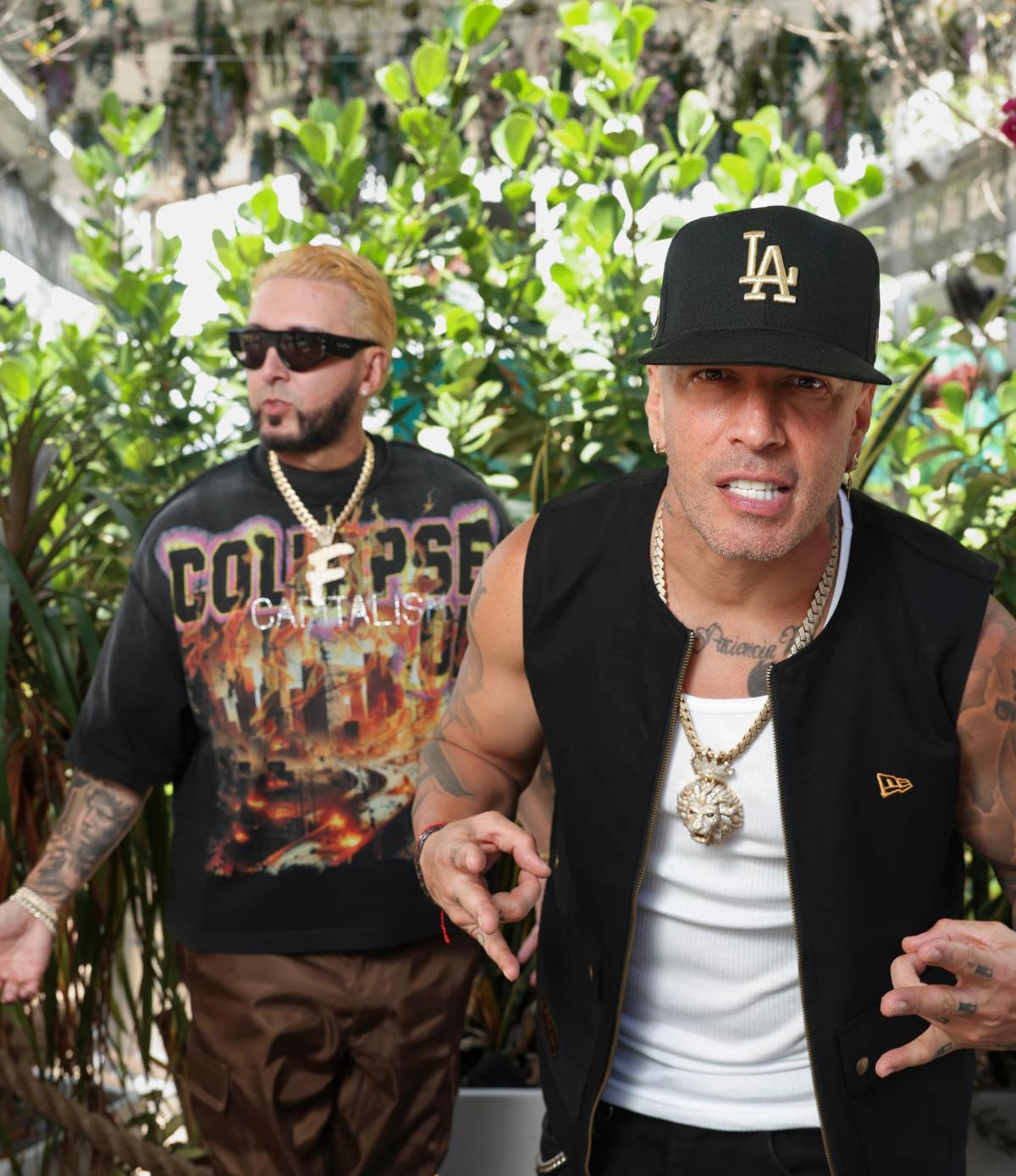 Alexis & Fido, a puerto rican reggaeton duo, pose during an interview on Monday, May 5, 2025, at Sufrat Restaurant in Doral, Fla. The urban duo is celebrating 20 years of their musical career. El dúo urbano está celebrando sus 20 años de trayectoria musical.