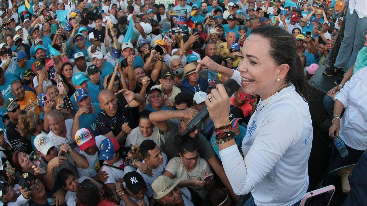Opposition leader and presidential candidate María Corina Machada addresses her supporters during a political rally, in Maracaibo, northwest Venezuela, on August 11, 2023.