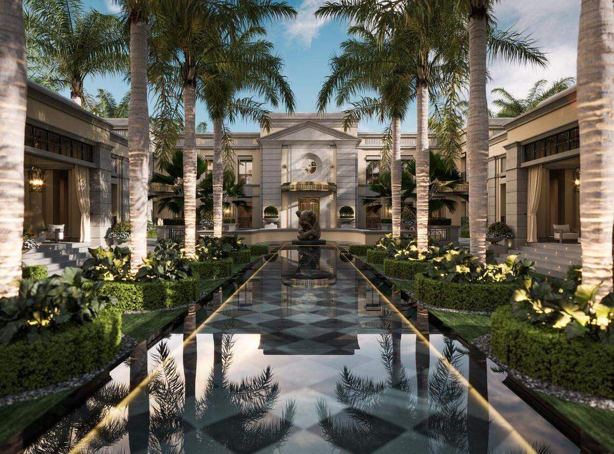 Representación exterior de la casa en construcción en el 7 Indian Creek Road, que incluye el paisajismo y las fuentes de la mansión.
