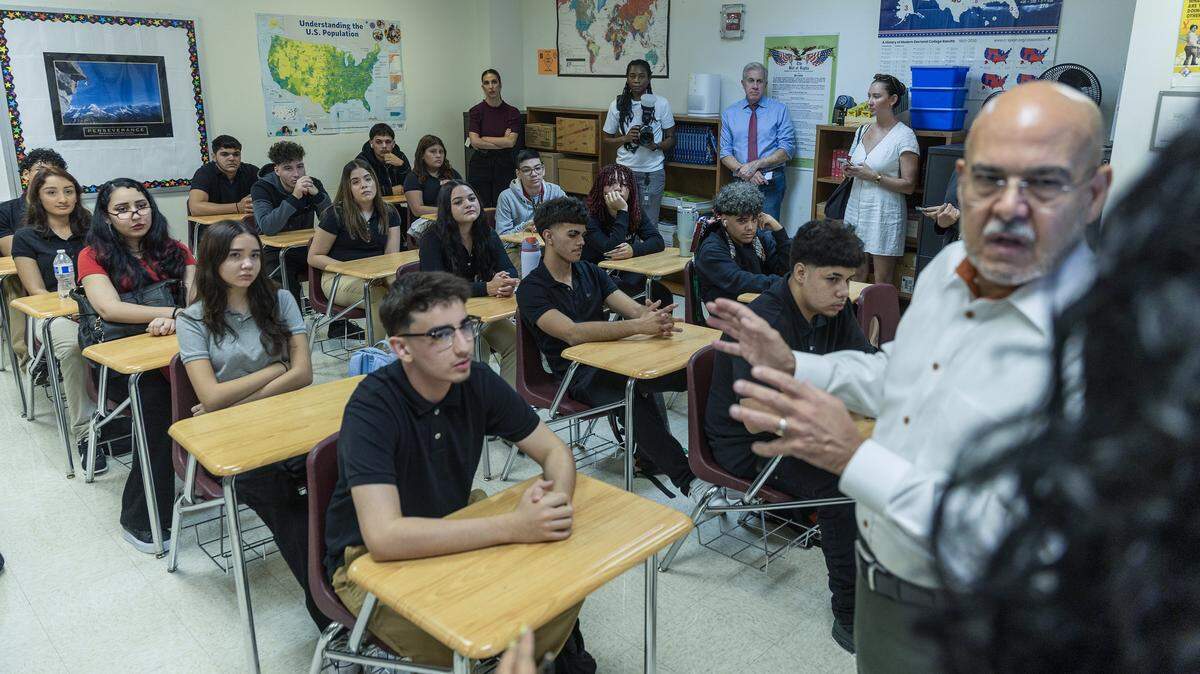 Superintendent of Schools Dr. Jose L. Dotres (center), talks to students at the Dr. Rolando Espinosa K-8 Center, during the first day of school for Miami-Dade County Public Schools (M-DCPS) in the 2025-2026 school year, on Thursday, August 14, 2025.

