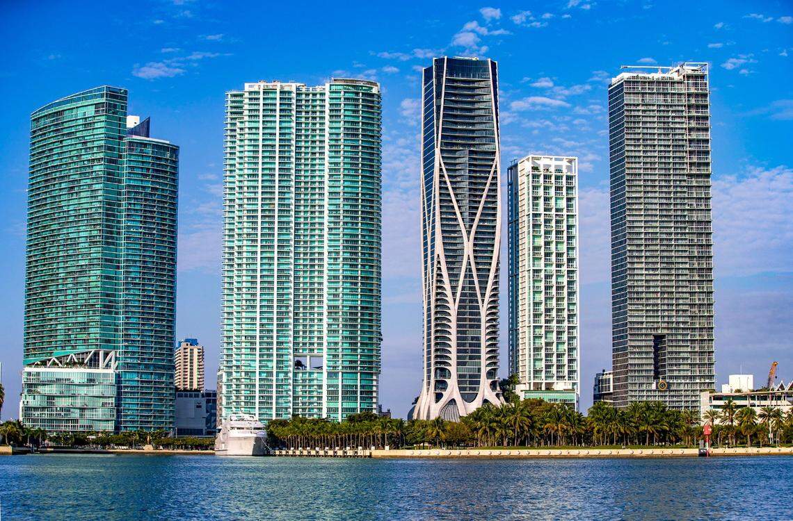 Miami skyline buildings from left: Marina Blue; 900 Biscayne; Scorpion Tower Miami designed by architect Zaha Hadid; 10 Museum Park and the Marquis Miami, taken Jan. 26, 2022. The Tunisian couple’s Miami federal lawsuit alleges that ‘Swagg Man’ swindled them by stealing $1.6 million and then buying two condos in the Marina Blue and Marquis buildings for himself. ‘Swagg Man’ denies the allegations.