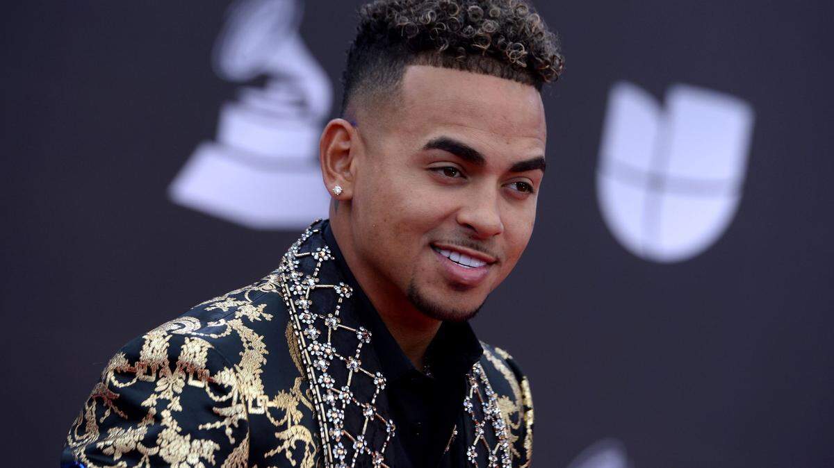 Puerto Rican singer Ozuna arrives at the 20th Annual Latin Grammy Awards in Las Vegas, Nevada, on November 14, 2019. (Photo by Bridget BENNETT / AFP) (Photo by BRIDGET BENNETT/AFP via Getty Images)