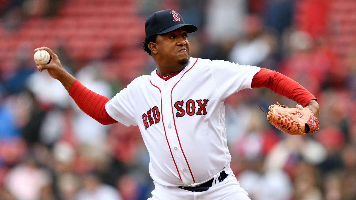 May 27, 2018; Boston, MA, USA; Boston Red Sox Alumni Pedro Martinez pitches during an Alumni Game at Fenway Park. Mandatory Credit: Brian Fluharty-USA TODAY Sports