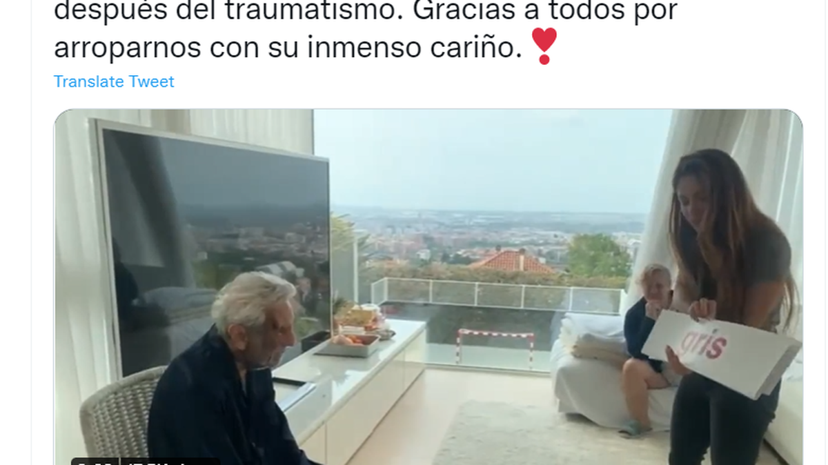 A screenshot of a tweet from Colombian singer, Shakira, whose father returned home after suffering an accident. Here she is helping him with his cognitive skills.