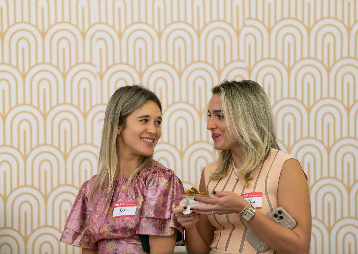 Cynthia Lopez-Rivas, right, a mom of two children and the owner of Caprilina, and her friend, Jessica Marie Mendez, participate in SHOP MOM hosted by The Mom Economy and Shopify inside Dadeland Mall in Miami’s Kendall neighborhood on Friday, November 5, 2021.