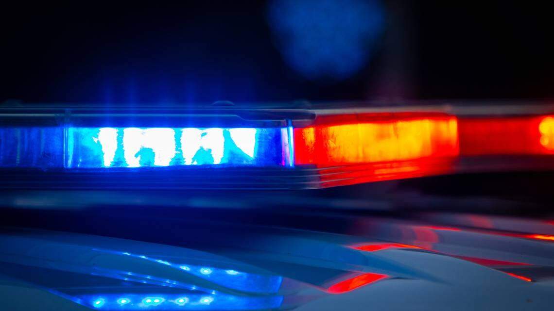 The woman was arrested on counts of robbery and child abuse, police said.