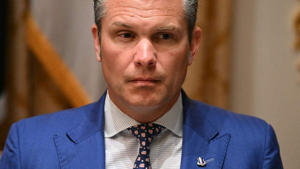 US Defense Secretary Pete Hegseth attends a meeting between Australia's Prime Minister Anthony Albanese and US President Donald Trump in the Cabinet Room at the White House in Washington, DC, on October 20, 2025. (Photo by SAUL LOEB / AFP) (Photo by SAUL LOEB/AFP via Getty Images)