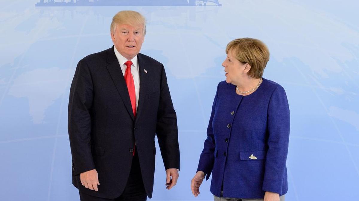 La canciller de Alemania, Angela Merkel, recibe al presidente de EEUU, Donald Trump, en Hamburgo, el 6 de julio, en vísperas de la cumbre del G20.