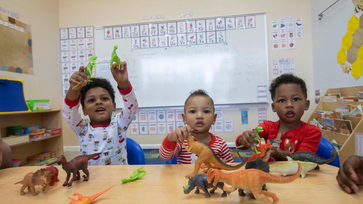 Brothers Mason De Paz, 4, Miles, 1, and Matthew, 3, attend Springview Academy of Hialeah on Friday, Dec. 23, 2022. The De Paz family receives a Thrive By 5 scholarship to cover their daycare.