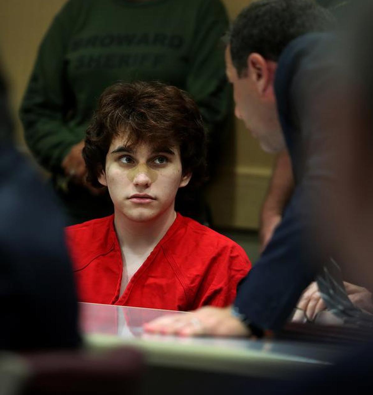 A security guard who worked at Marjory Stoneman Douglas when Nikolas Cruz attended the Parkland school said he searched the student for guns every day, according to a sworn deposition.