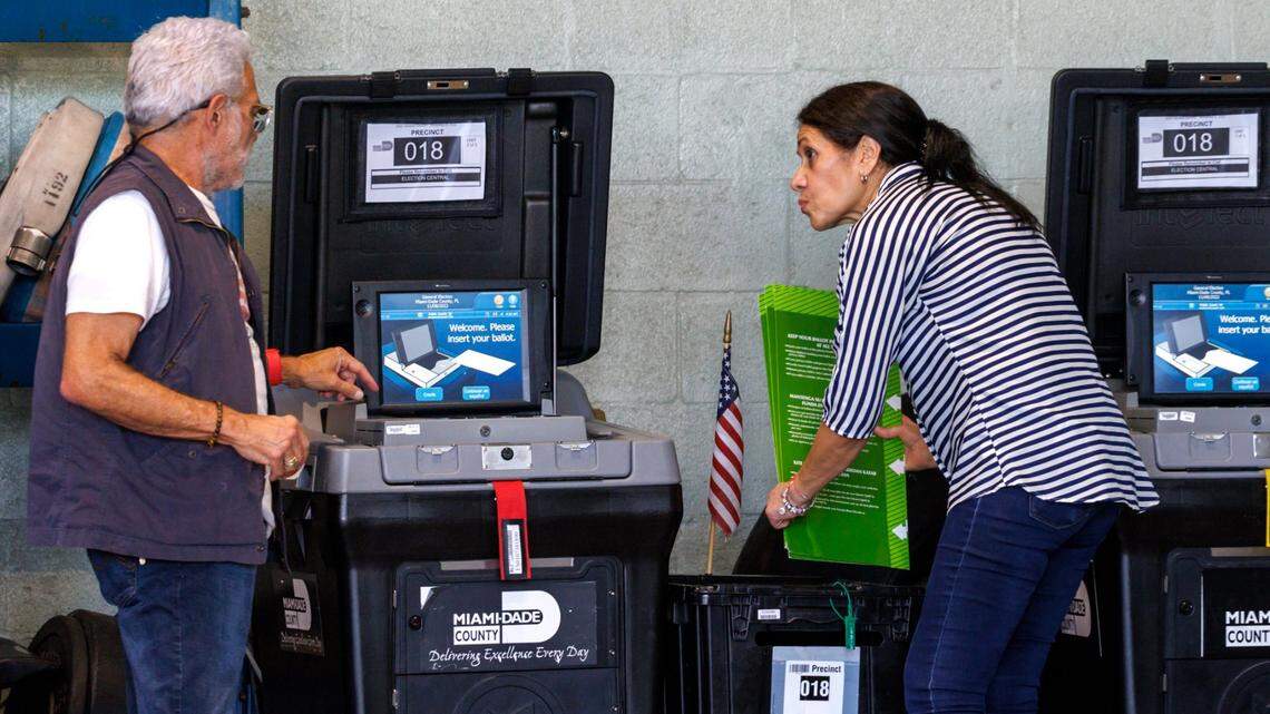 Polling workers next to the voting machines during the midterm elections in Miami-Dade County at the Miami Beach Fire Department - Station 4 on Tuesday, November 8, 2022 in Miami Beach, Florida.