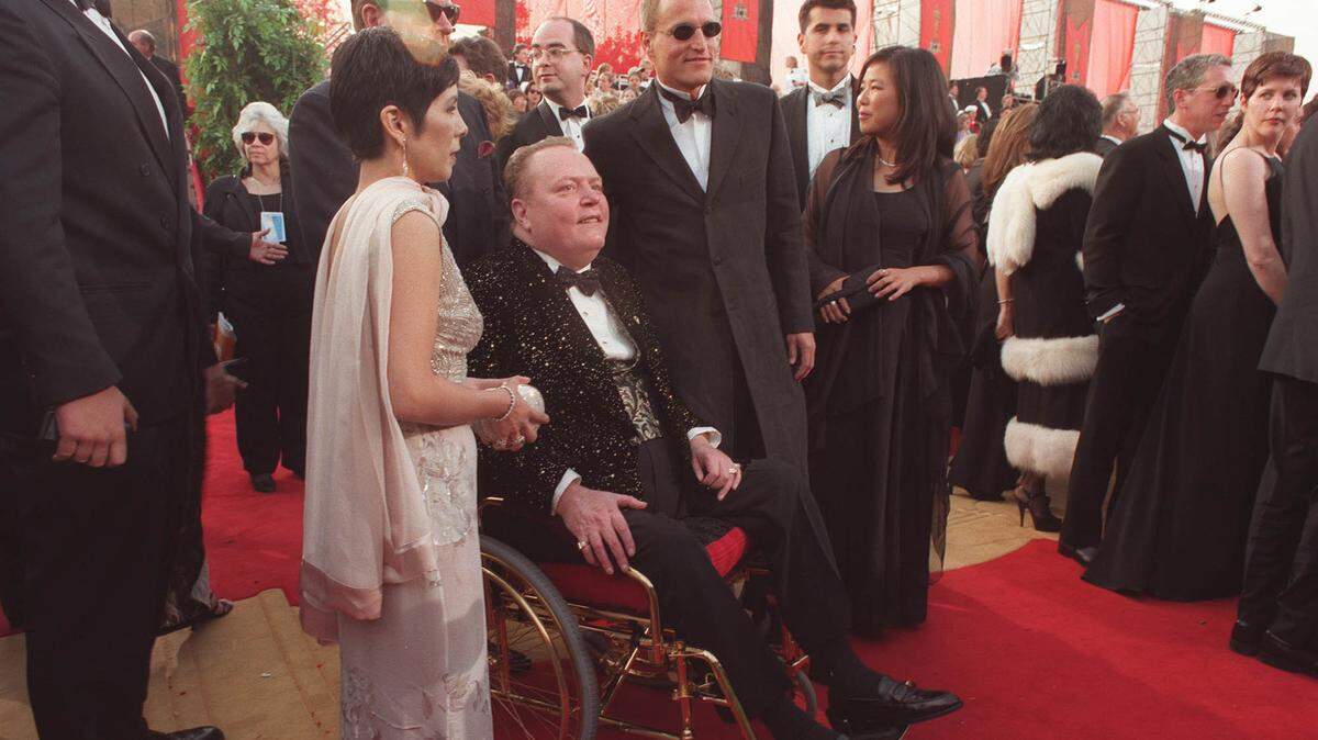 Larry Flynt, flanked by actor Woody Harrelson, who played him in “The People versus Larry Flynt” in 1996.
