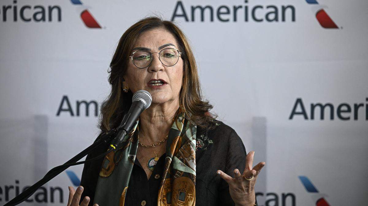 Venezuela's Transport Minister Jacqueline Faria speaks during a press conference at Simon Bolivar International Airport in La Guaira, La Guaira state, Venezuela, ahead of the arrival of a flight from Miami on April 30, 2026. The first direct flight between the United States and Venezuela in seven years took off on April 30, a new sign of a thaw after Washington deposed leftist leader Nicolas Maduro. (Photo by Federico PARRA / AFP via Getty Images)