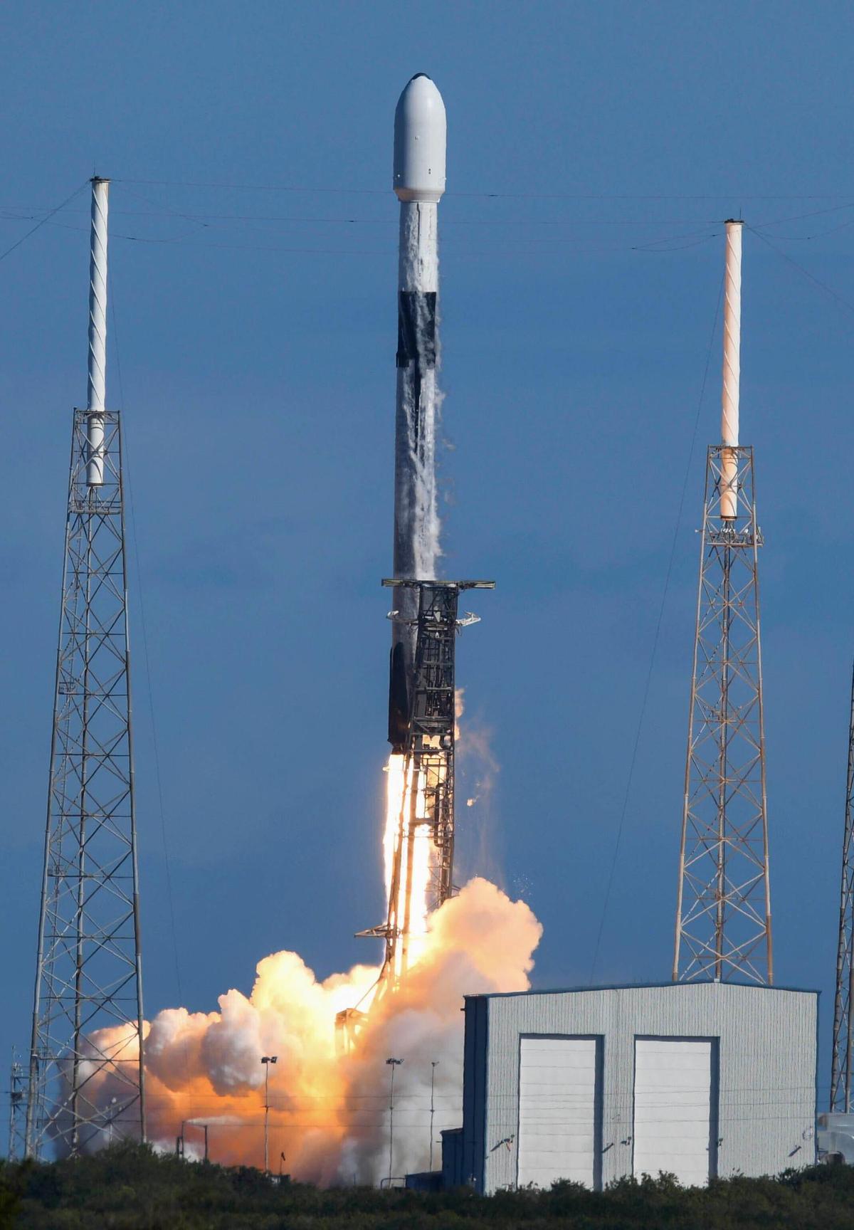 A SpaceX Falcon 9 rocket lifts off from Cape Canaveral Space Force Station, Fla., Thursday, Jan. 13, 2022. The rocket is carrying a number of small satellites on a ride-sharing mission. (Craig Bailey/Florida Today via AP)