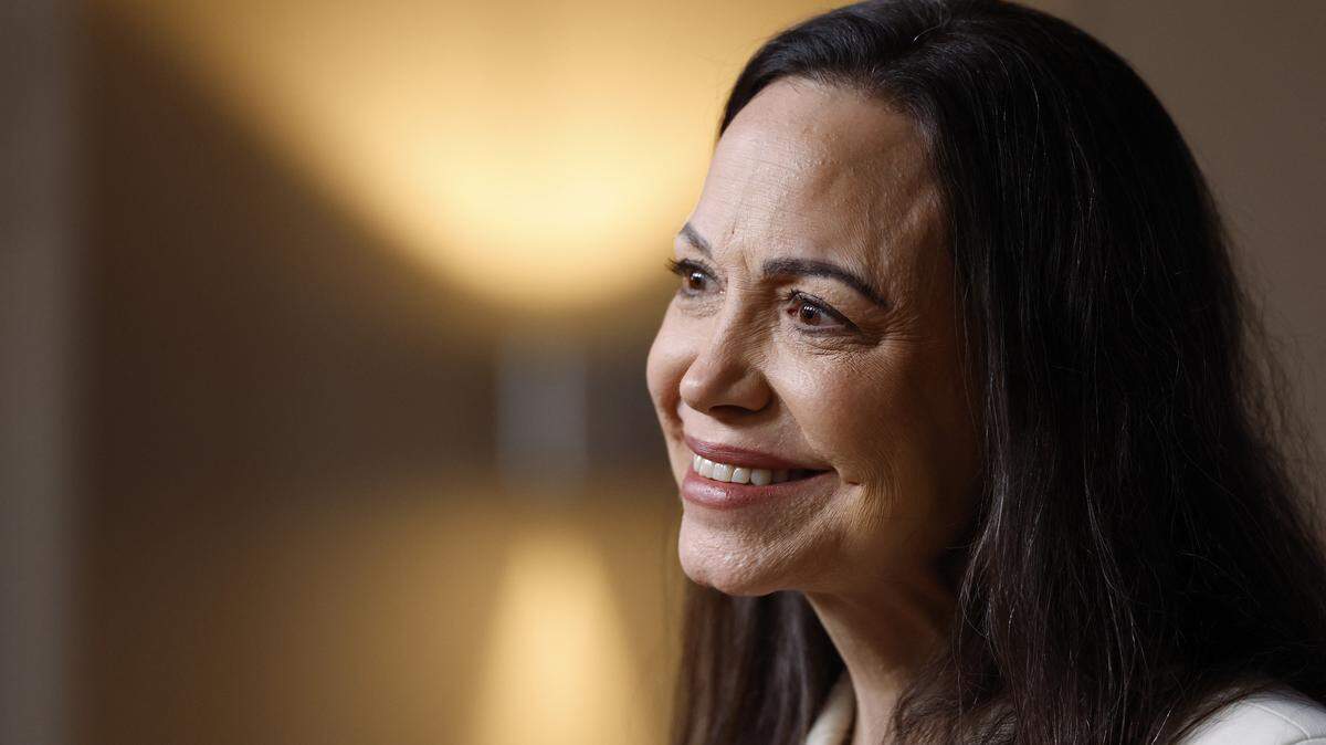 Nobel Peace Prize winner Maria Corina Machado addresses a press conference on December 11, 2025 at the Norwegian government's representative facilities in Oslo. Machado arrived in the Norwegian capital hours after the Venezuelan opposition leader's award was collected on her behalf by her daughter. (Photo by Odd ANDERSEN / AFP via Getty Images)