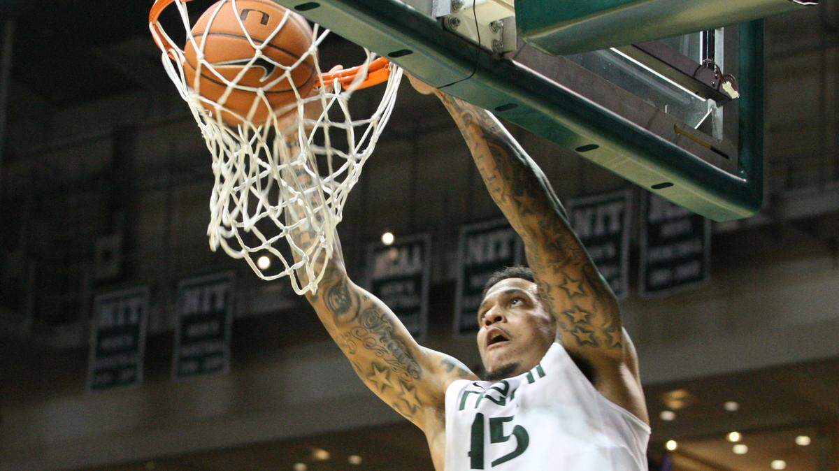 UM Julian Gamble dunks the ball in the first half during the game University of MIami vs Florida State University on Sunday,January 27, 2013 at theBank United Center in Coral Gables. Gamble, now 34, played in the Israeli Basketball Premier League last season and has been deeply affected by the Israel-Hamas war.