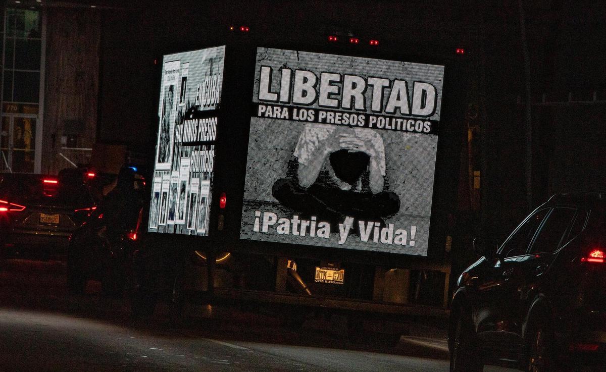 An advertising truck displays a request to the Cuban regime to free the political prisoners and to allow activist Anameli Ramos to return to Cuba after she was denied boarding an AA flight to Havana, leaving her stranded in Miami, A pacific march took place from the Cuban restaurant Versailles to the American Airlines offices in Coral Gables, on Friday February 18, 2022,