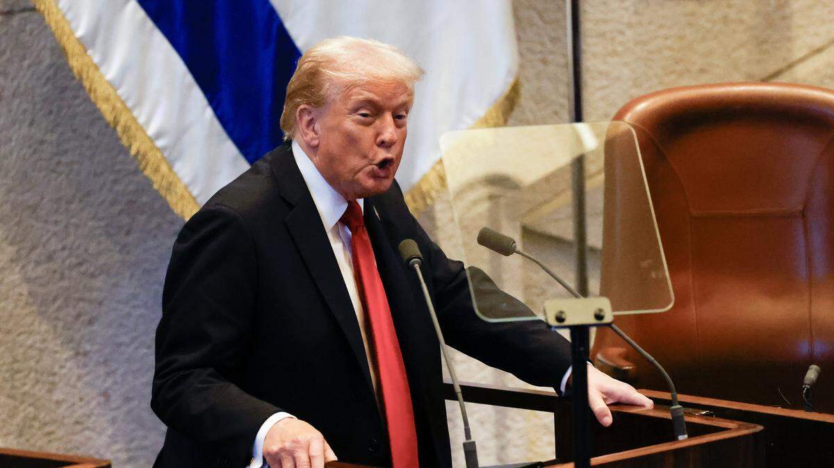 JERUSALEM - OCTOBER 13: US President Donald Trump addresses the Israeli parliament, in the Knesset, Israel's parliament, on October 13, 2025 in Jerusalem. President Trump is visiting the country hours after Hamas released the remaining Israeli hostages captured on Oct. 7, 2023, part of a US-brokered ceasefire deal to end the war in Gaza. (Photo by Jalaa Marey - Pool/Getty Images)