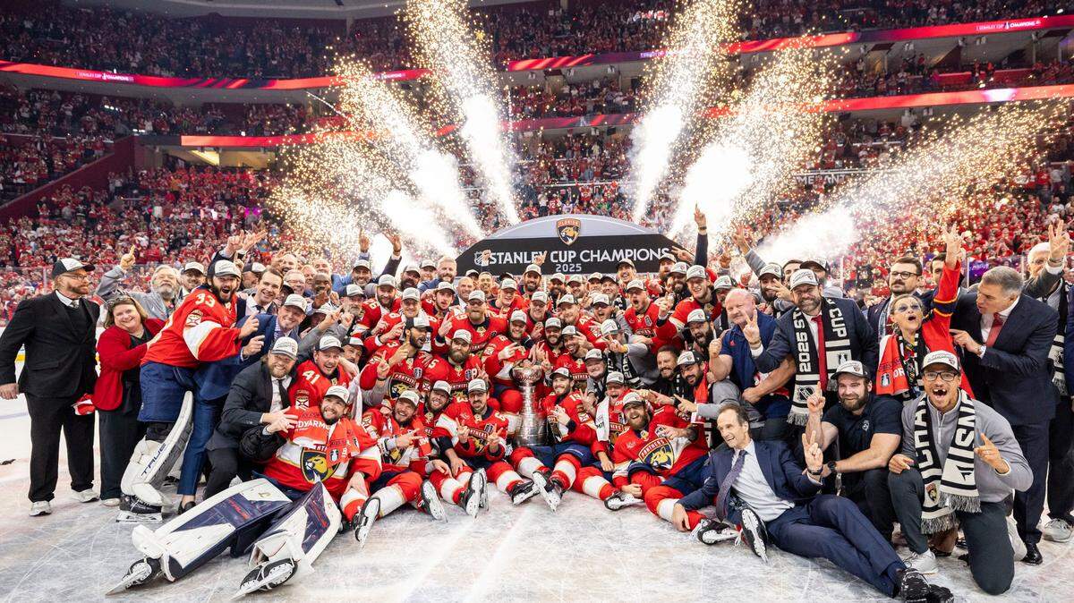 The Florida Panthers pose for a photo with the Stanley Cup after the Panthers defeated the Edmonton Oilers in Game 6 on Thursday, June 17, 2025, in Sunrise, Fla.