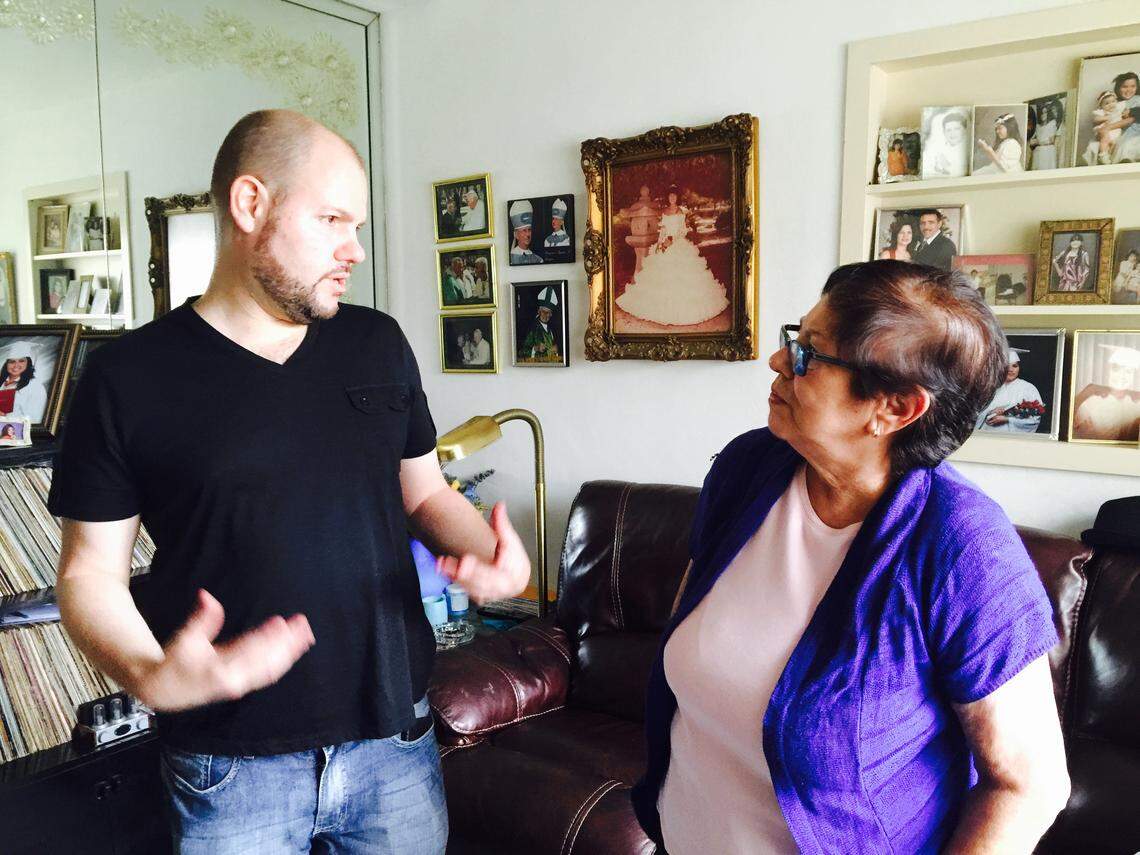 El Nuevo Herald editor Daniel Shoer Roth with Iraida Román Martínez during the research for the biography “Agustín Román: Pastor, Profeta, Patriarca”, published in 2015 by the Shrine of Our Lady of Charity.