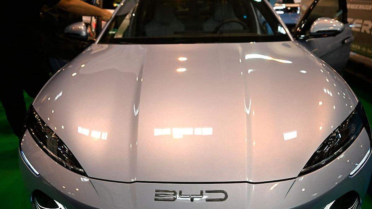 A BYD car is on display at the Essen Motor Show in Essen, western Germany on December 3, 2025. The Essen Motor Show, featuring the areas of performanc,e & racing, tuning & lifestyle, motorsport and classic cars, takes place from November 29 to December 7, 2025. (Photo by Ina FASSBENDER / AFP via Getty Images)