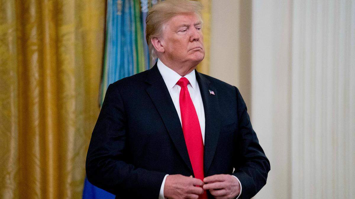 El presidente Donald Trump arriba a un evento en la Sala Este de la Casa Blanca el 22 de agosto del 2018.