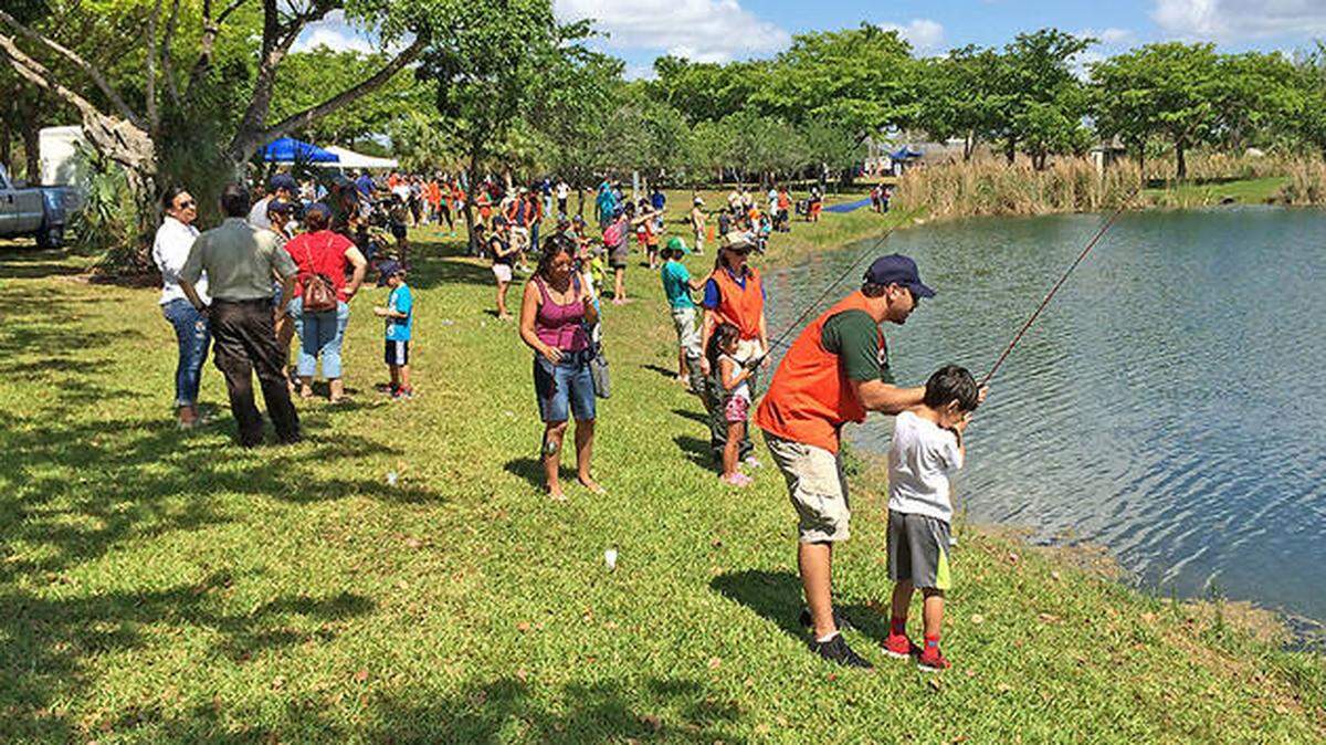 Visitors to Miami-Dade County’s Tropical Park, where Miami mogul John Ruiz wants to build a football stadium for the University of Miami.