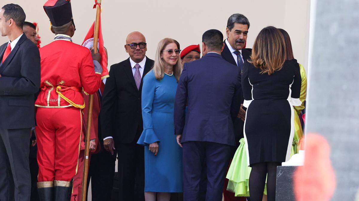 In Caracas, Venezuela, on Friday, President Nicolas Maduro, second from right, arrives at the National Assembly for the swearing-in ceremony of his third term in office.
