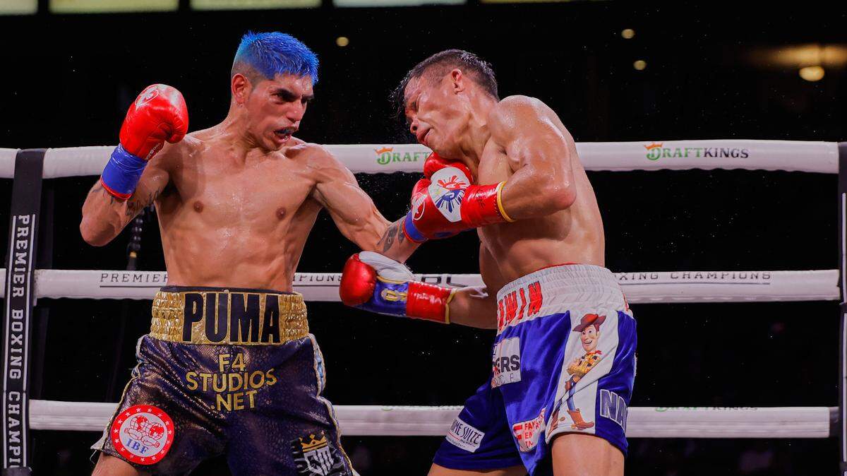 Fernando Martínez (izq.) demostró que lo ocurrido meses atrás cuando le arrebató la faja de la Federación Internacional del Boxeo a Jerwin Ancajas, no fue obra de la casualidad porque en la revancha el argentino se mostró todavía más dominante.