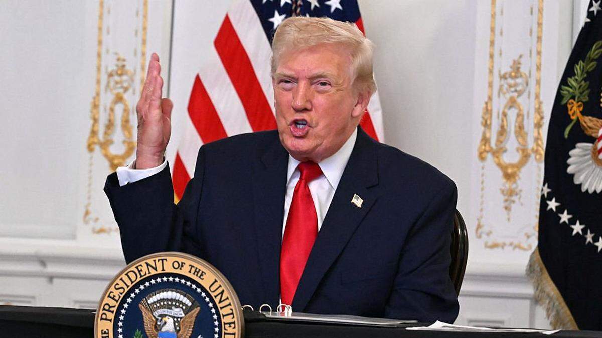 US President Donald Trump participates in a video call with military service members from his Mar-a-Lago residence in Palm Beach, Florida, on November 27, 2025, during the Thanksgiving holiday. US President Donald Trump said Thursday that Sarah Beckstrom, one of the two National Guard troops shot a day earlier near the White House, had died, while the other soldier was "fighting for his life." (Photo by Jim WATSON / AFP via Getty Images)