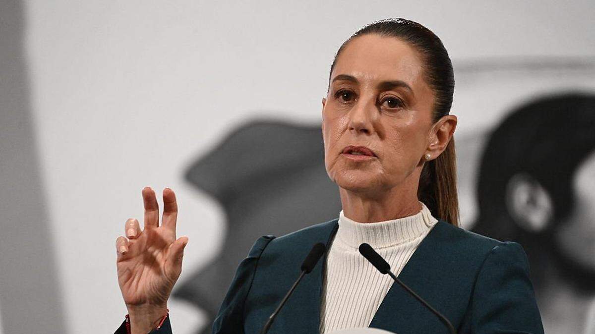 Mexico's President Claudia Sheinbaum speaks during her daily press conference at Palacio Nacional in Mexico City on October 13, 2025 . At least 64 people have died and 65 remain missing in Mexico following heavy rains that caused flooding and left a trail of destruction in the worst-affected states of Hidalgo, Puebla, Queretaro and Veracruz, the government announced. (Photo by YURI CORTEZ / AFP) (Photo by YURI CORTEZ/AFP via Getty Images)