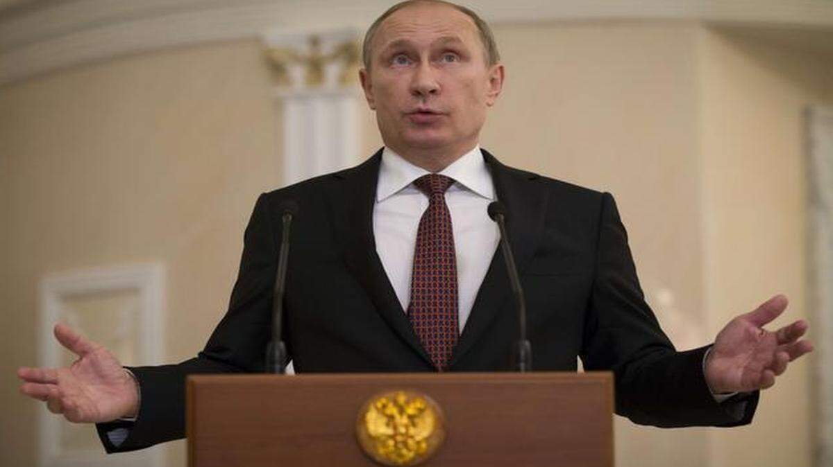 
El presidente ruso Vladimir Putin en rueda de prensa después de una cumbre dirigida a terminar el conflicto en Ucrania, celebrada en Minsk el 12 de febrero. 
